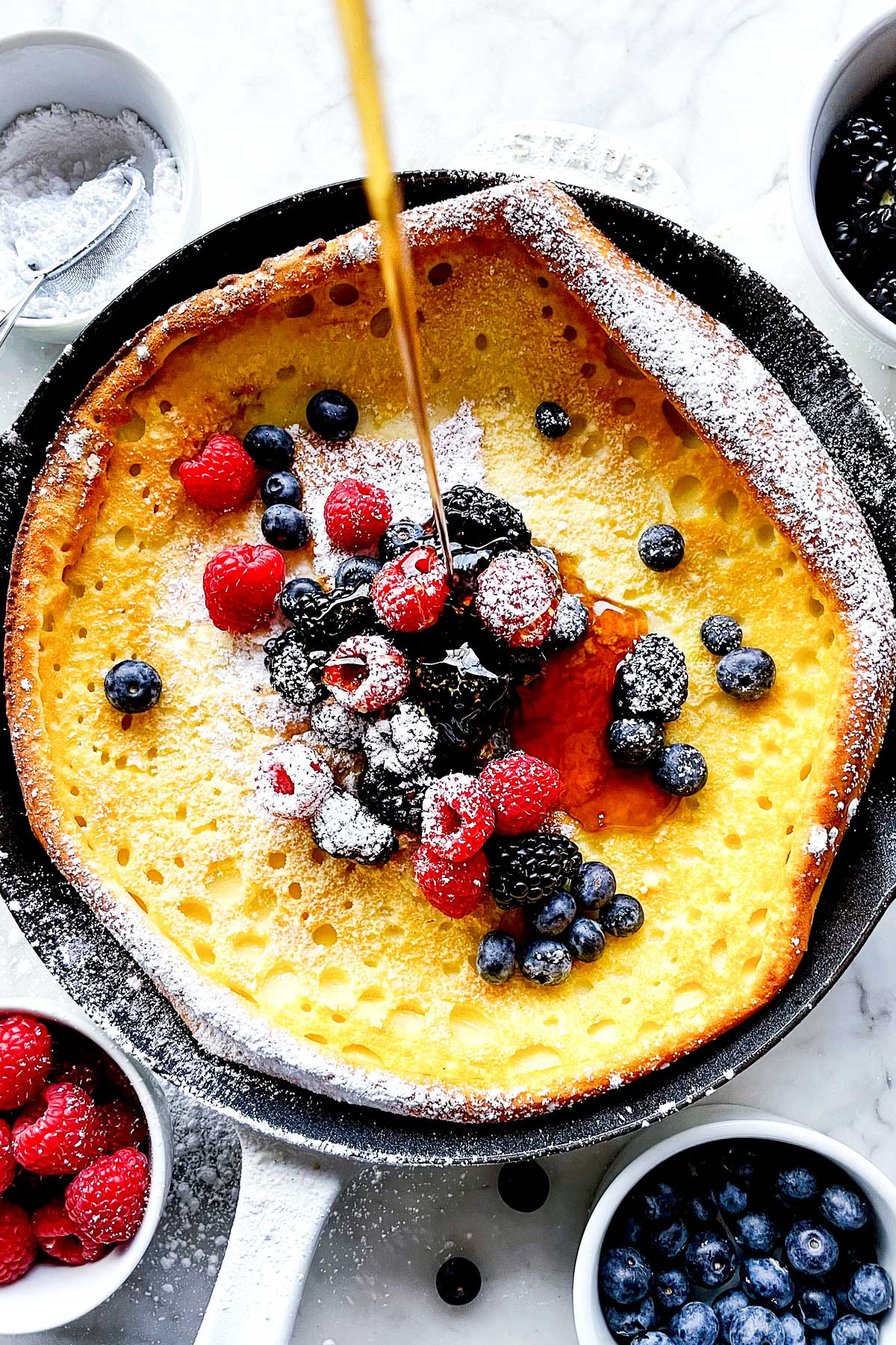 Dutch Baby with Syrup and Berries foodiecrush.com
